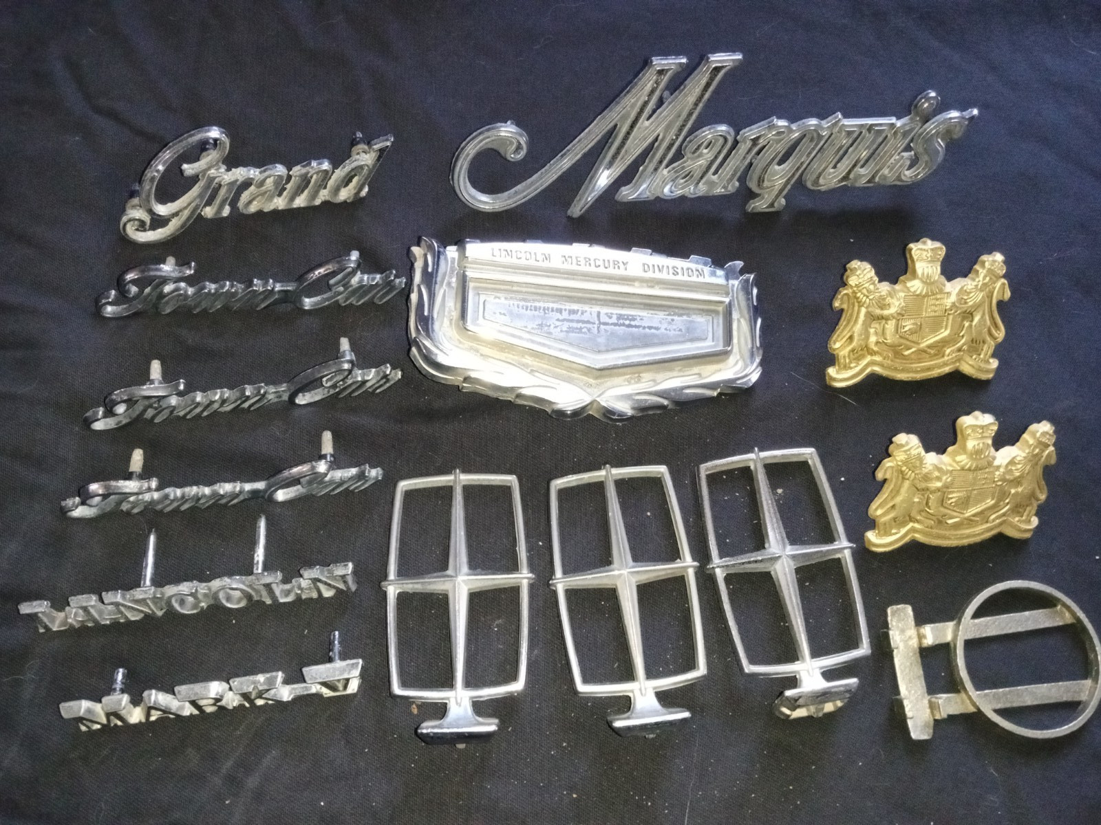 Lincoln hood ornaments and emblems - lot of 14 - vintage chrome