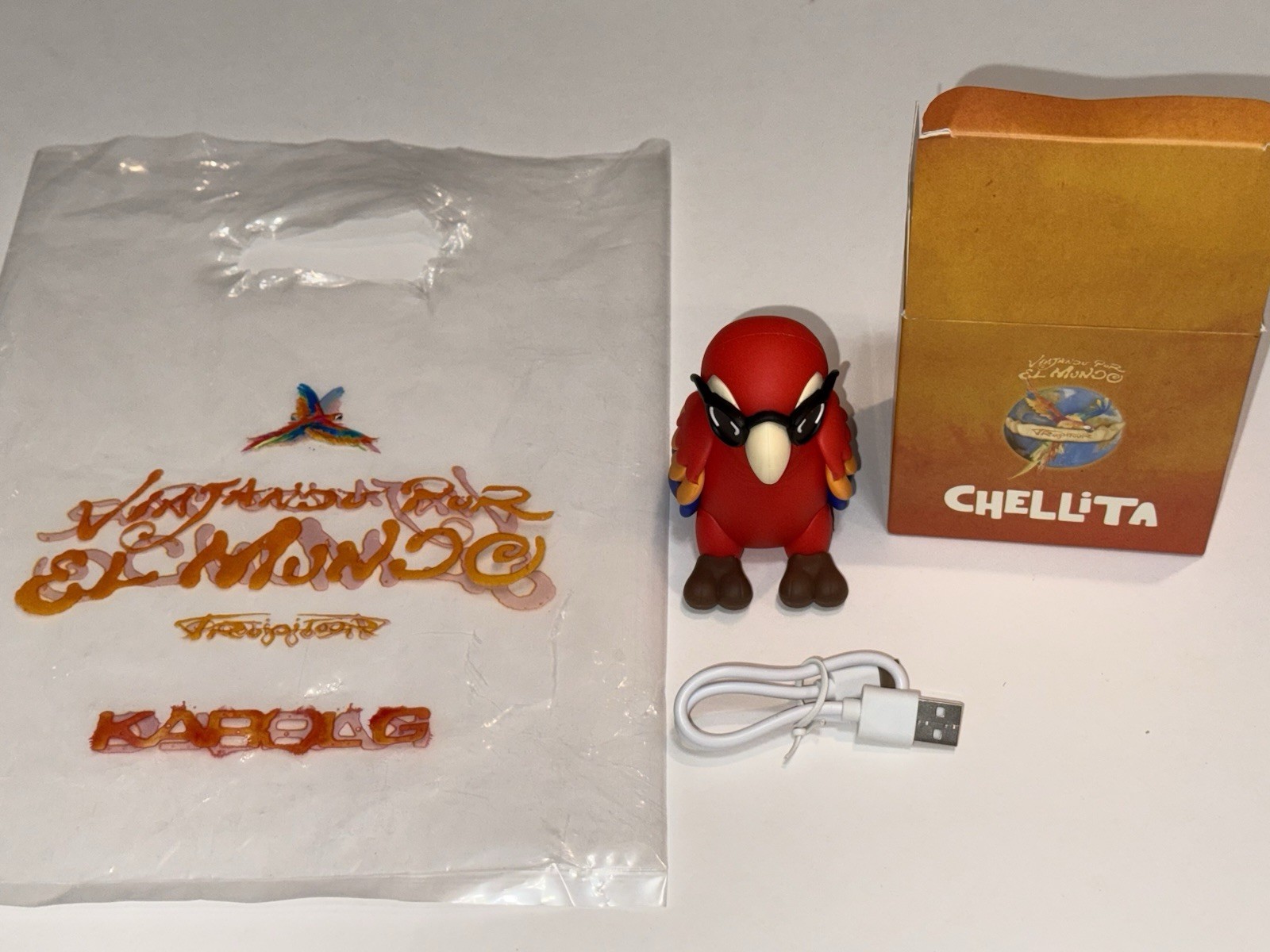 Karol G - VIP Exclusive Chellita Powerbank - Viajando Por El Mundo Tour + Bag Karol G - VIP Exclusive Chellita Powerbank - Viajando Por El Mundo Tour + Bag