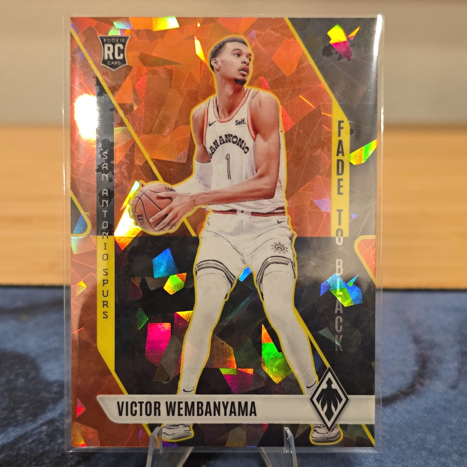 Panini 2023-24 Phoenix Fade to Black Orange Ice #11 /249 Wembanyama Spurs