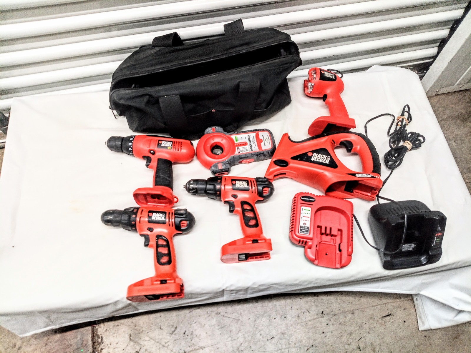 Lot of Cordless Power Tools And Charger Black+Decker+ Bag. Missing Batteries.