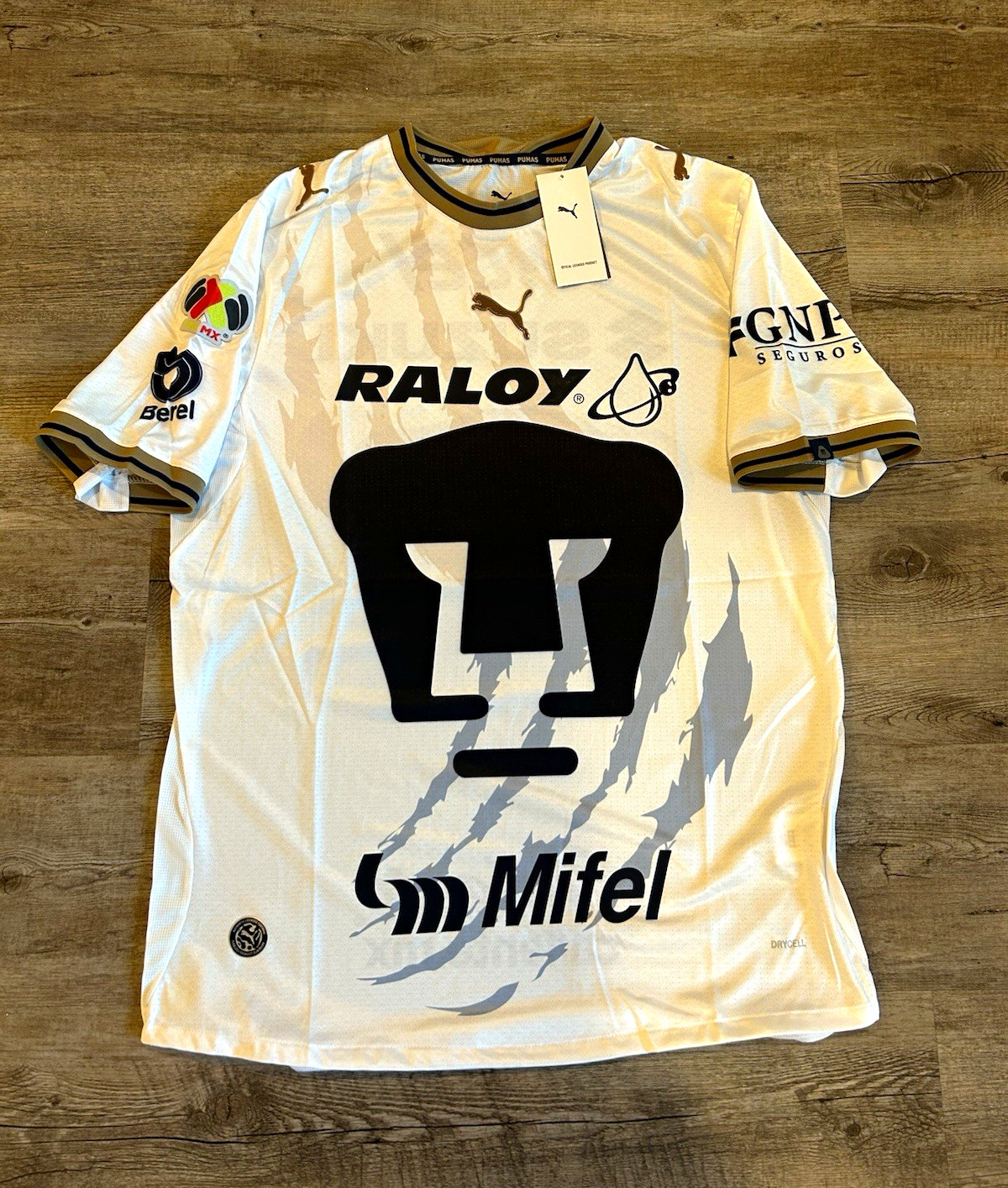 PUMA Pumas UNAM Soccer Jersey - White Black Gold PUMA Pumas UNAM Soccer Jersey - White Black Gold