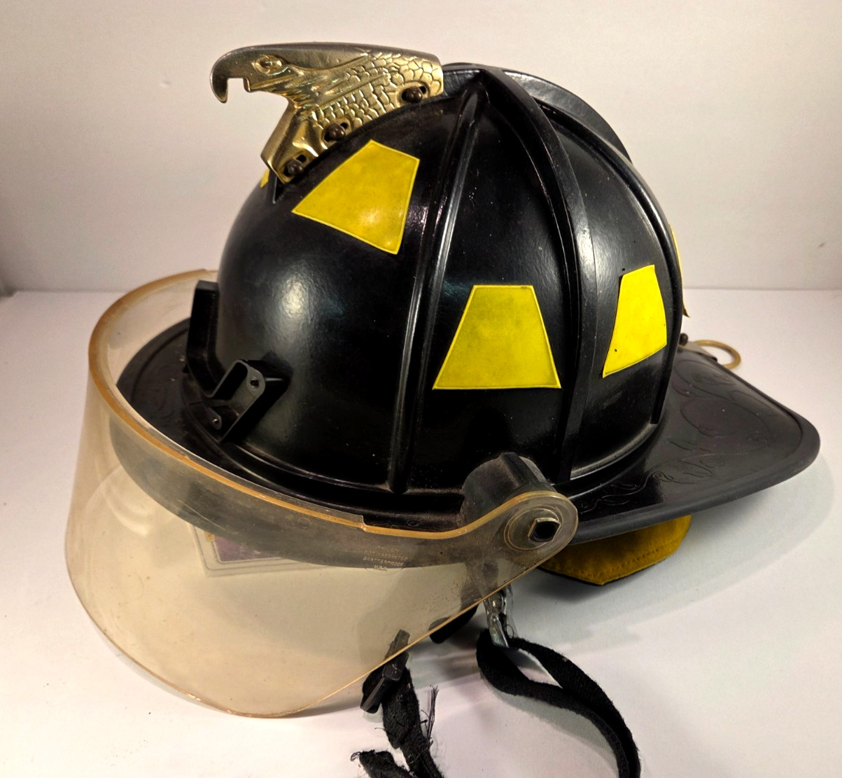 Morning Pride Fire Helmet With Golden Eagle and Visor Shield vintage used Morning Pride Fire Helmet With Golden Eagle and Visor Shield vintage used