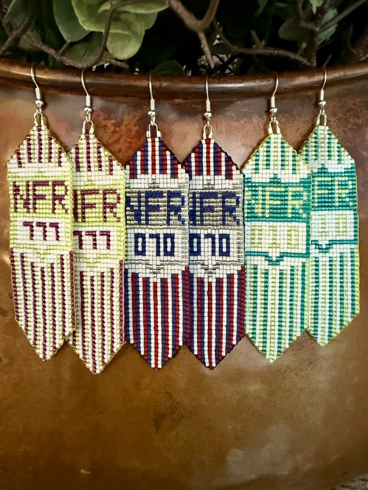Handmade Beaded NFR Earrings that Glow in Black Lights