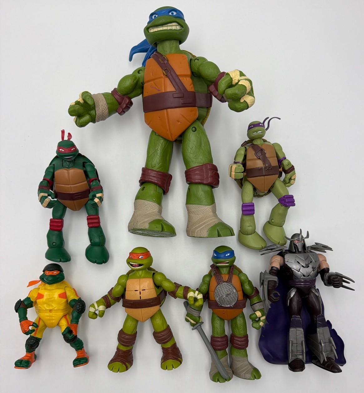 Teenage Mutant Ninga Turtles Lot of 7 Action Figures Shredder Leonardo Raphael
