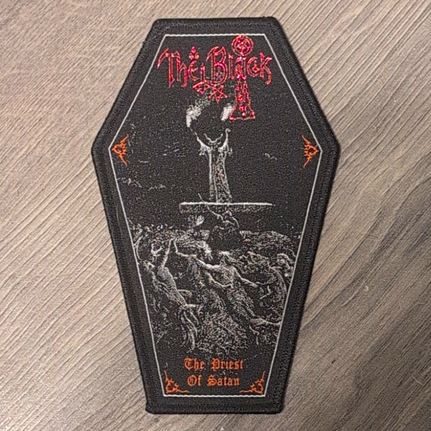 The Black “The Priest Of Satan” Coffin Shaped Woven Patch