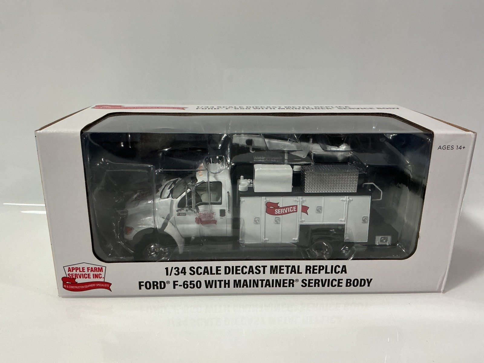 1:34 FIRST GEAR FORD F650 WITH MAINTAINER SERVICE BODY APPLE FARMS