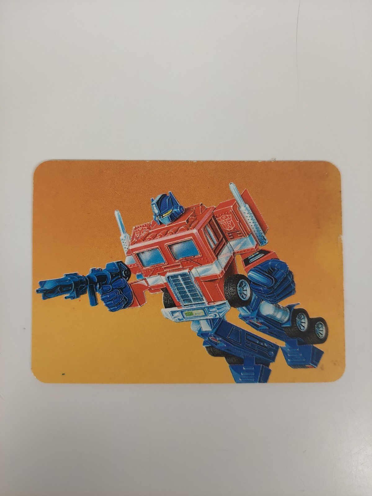 1985 Hasbro Transformers Action Cards # 1 Optimus Prime Rookie Card Lower Grade 1985 Hasbro Transformers Action Cards # 1 Optimus Prime Rookie Card Lower Grade