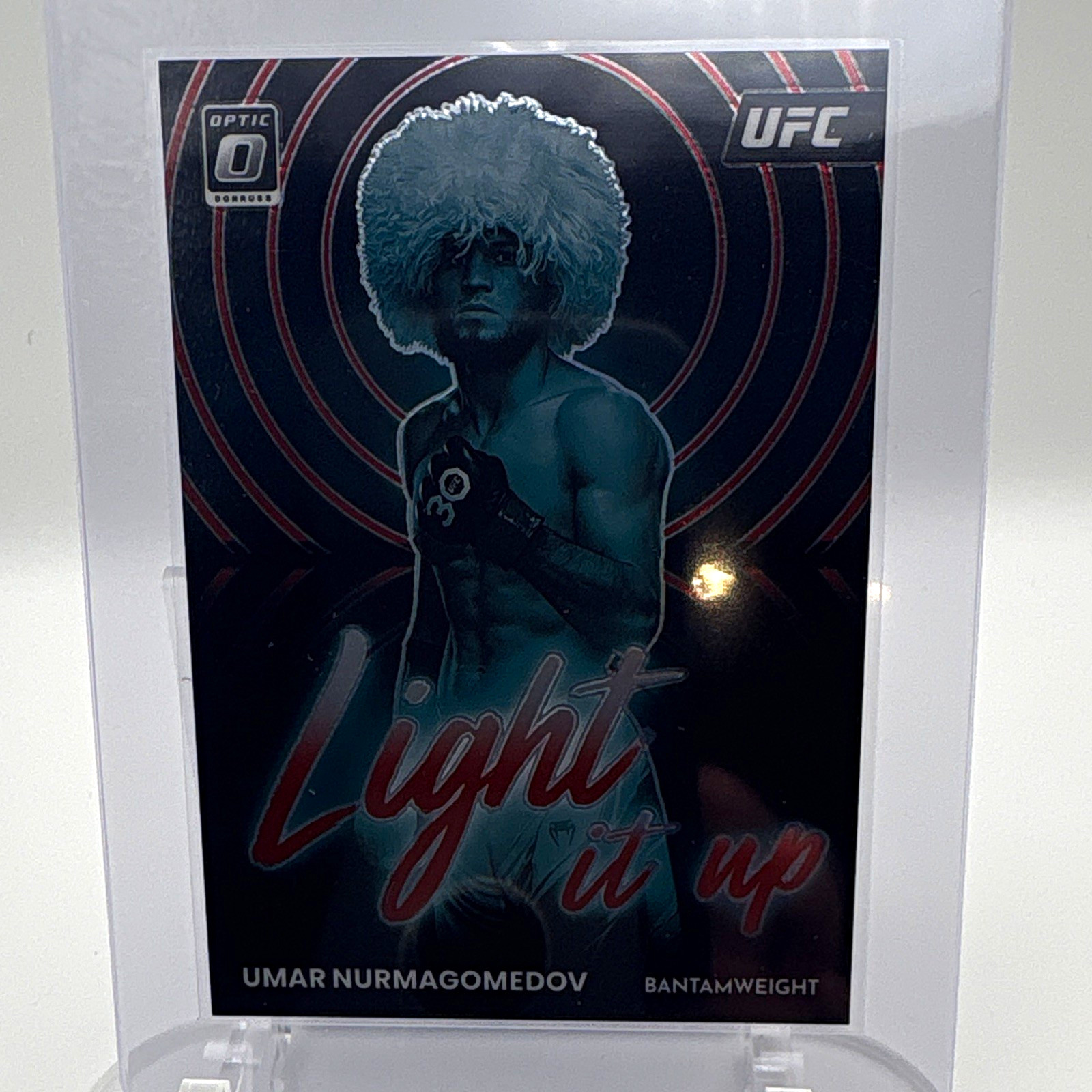 Panini 2023 Donruss Optic UFC Umar Nurmagomedov Light It Up Red Prizm #18 /99