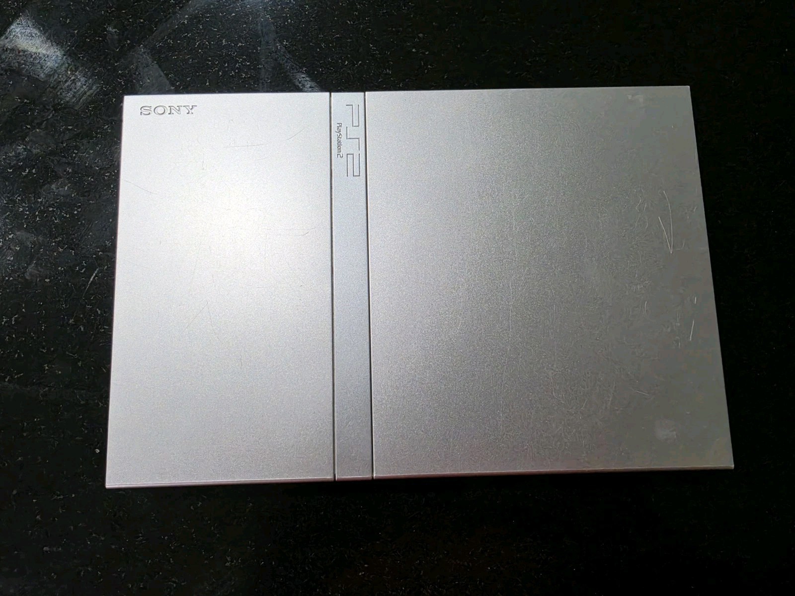 Sony PlayStation 2 PS2 Slim Silver Console Only. Tested Working Read Sony PlayStation 2 PS2 Slim Silver Console Only. Tested Working Read