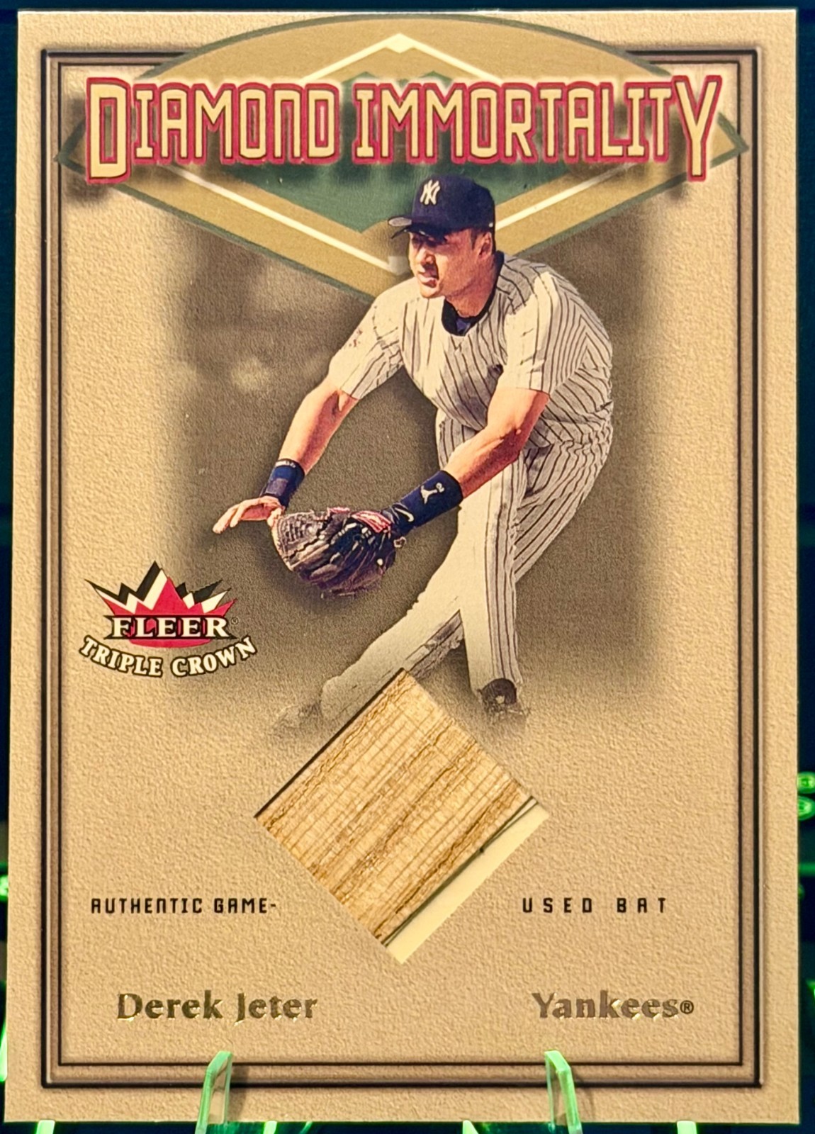 Derek Jeter 2002 Fleer Triple Crown Diamond Immortality GM Used Bat Relic Derek Jeter 2002 Fleer Triple Crown Diamond Immortality GM Used Bat Relic