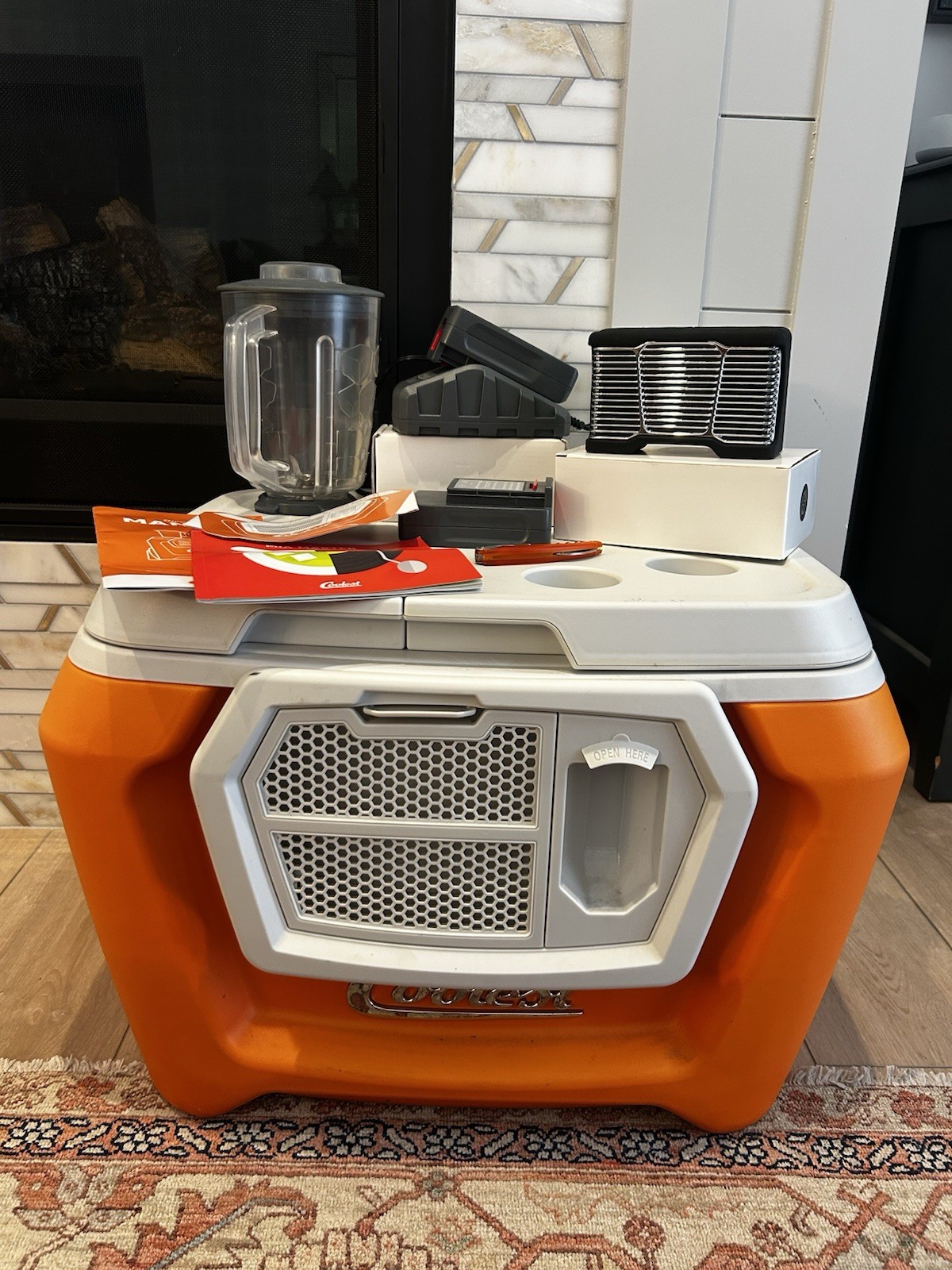 ORANGE COOLEST COOLER WITH BLENDER AND 2 BATTERIES AND EXTRAS WORKS GREAT ORANGE COOLEST COOLER WITH BLENDER AND 2 BATTERIES AND EXTRAS WORKS GREAT