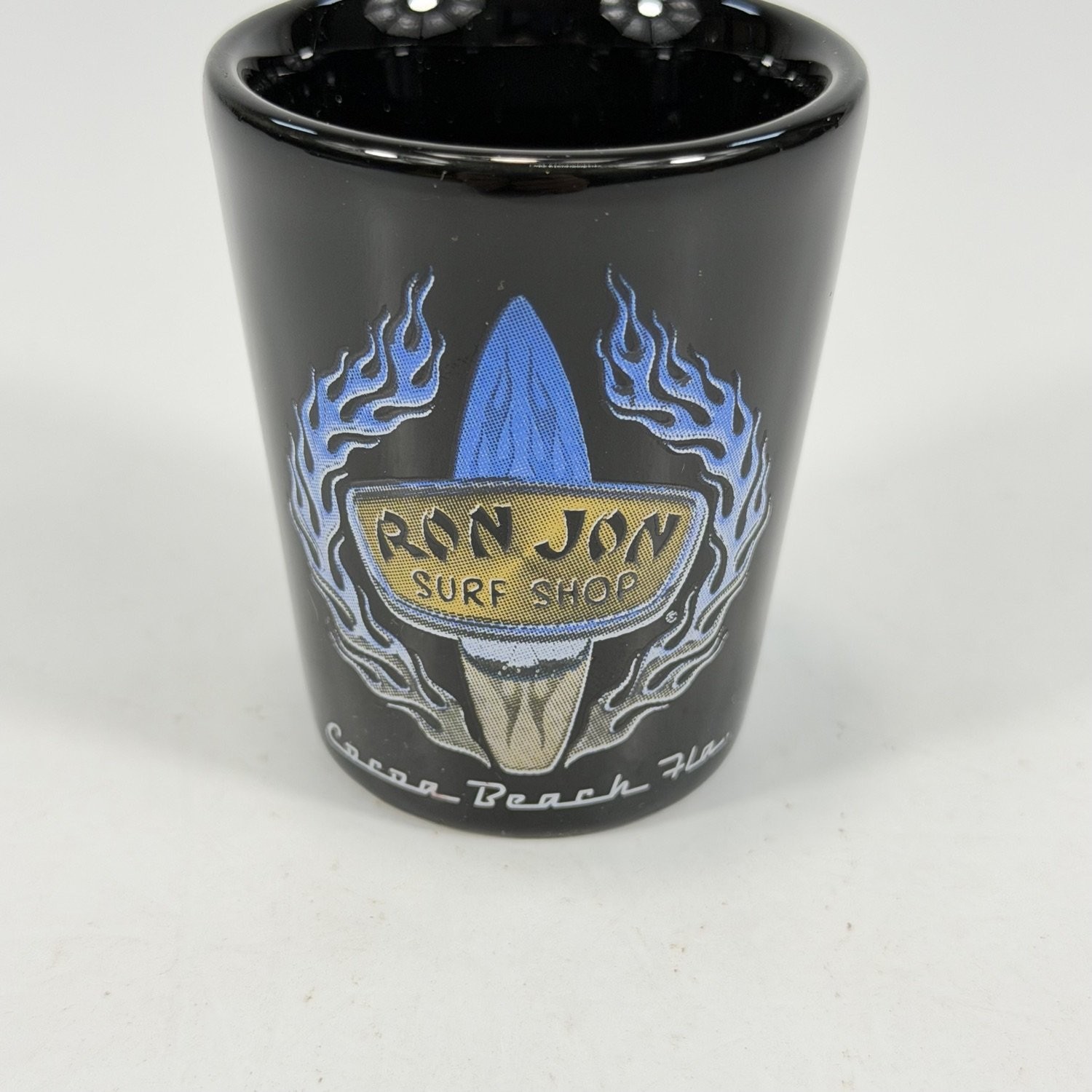 Vtg Ron Jon Surf Shop Cocoa Beach Fla. Souvenir Shot Glass 2.25 Black Ceramic Vtg Ron Jon Surf Shop Cocoa Beach Fla. Souvenir Shot Glass 2.25 Black Ceramic