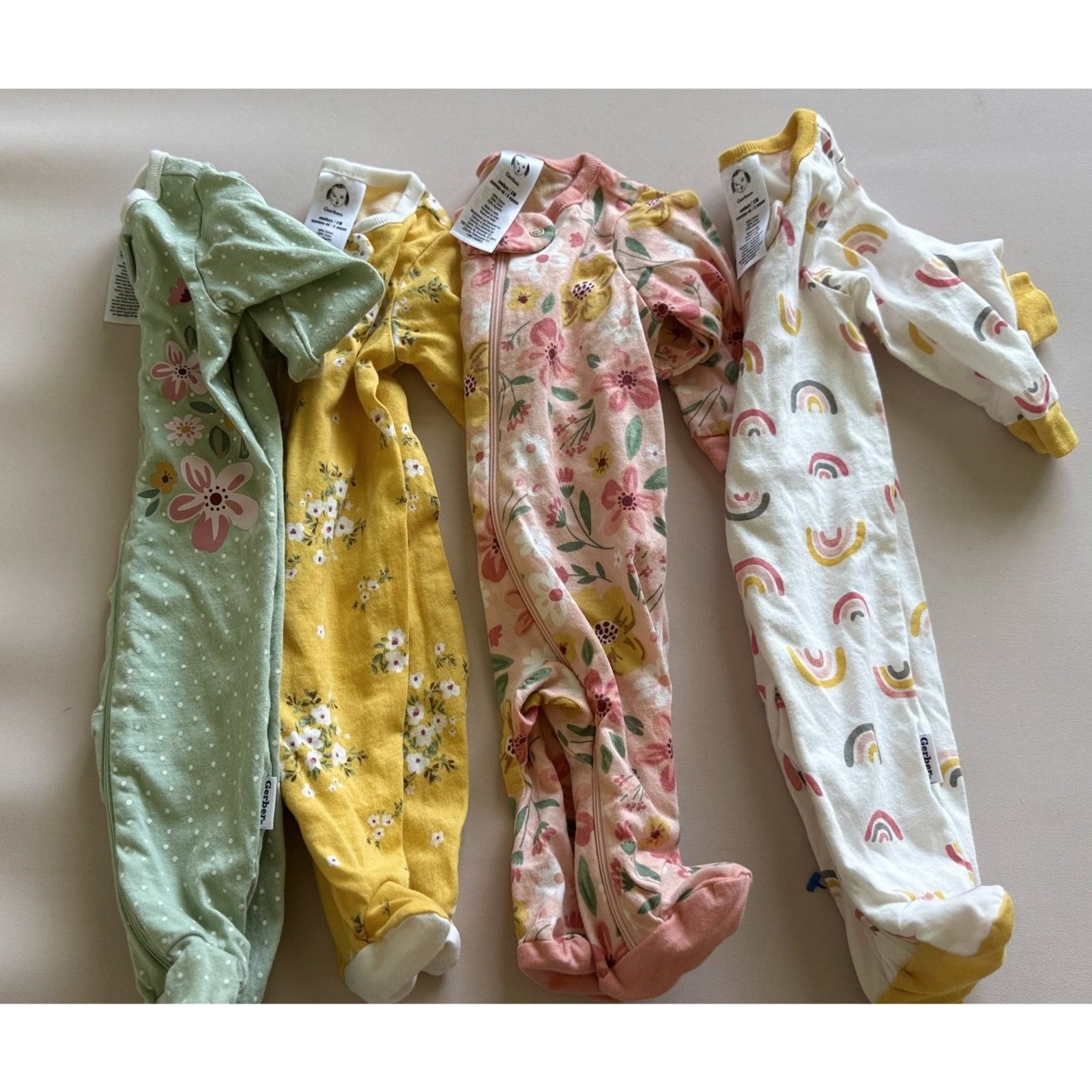 Gerber Baby Girls Newborn Sleepers Lot of 4 Floral Rainbow Footed Pajamas NB Gerber Baby Girls Newborn Sleepers Lot of 4 Floral Rainbow Footed Pajamas NB