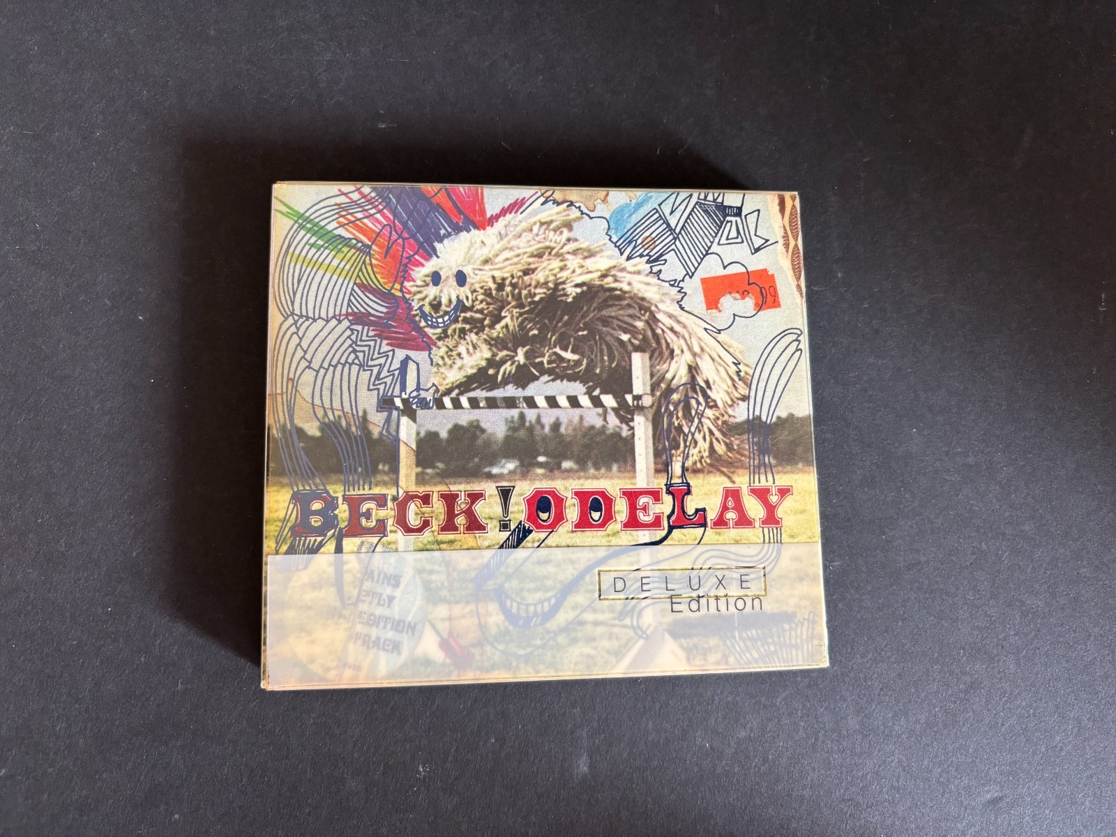 Beck - Odelay - Deluxe Edition with Book and Insert Card - 2 Disk Set Beck - Odelay - Deluxe Edition with Book and Insert Card - 2 Disk Set