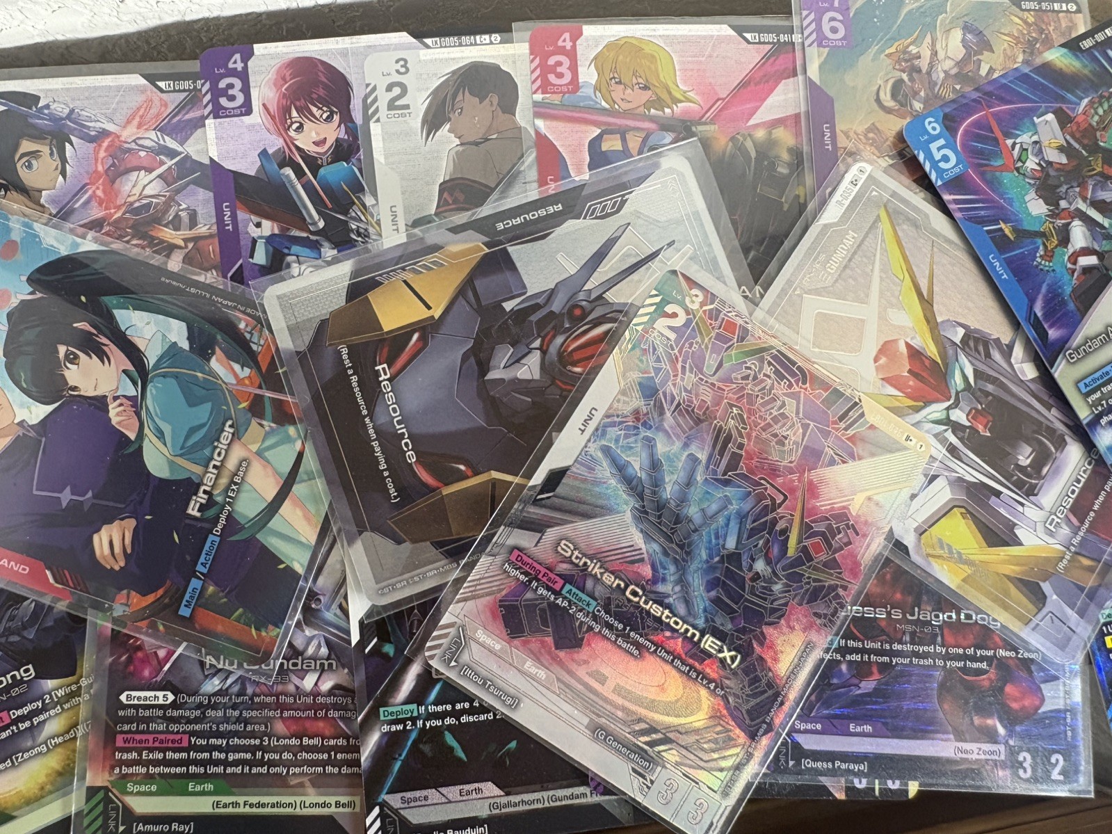 100 MIXED Gundam TCG Cards Bulk Lot- C/U/R holos/LR from GD02/GD03/GD04/GD05 100 MIXED Gundam TCG Cards Bulk Lot- C/U/R holos/LR from GD02/GD03/GD04/GD05