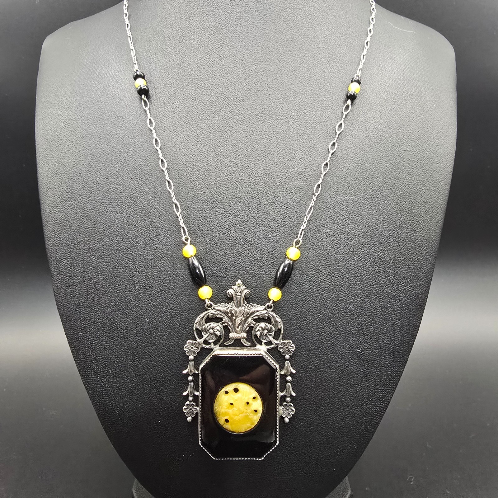 Antique Art Deco White Metal Black Onyx Carved Floral Filigree Pendant Necklace