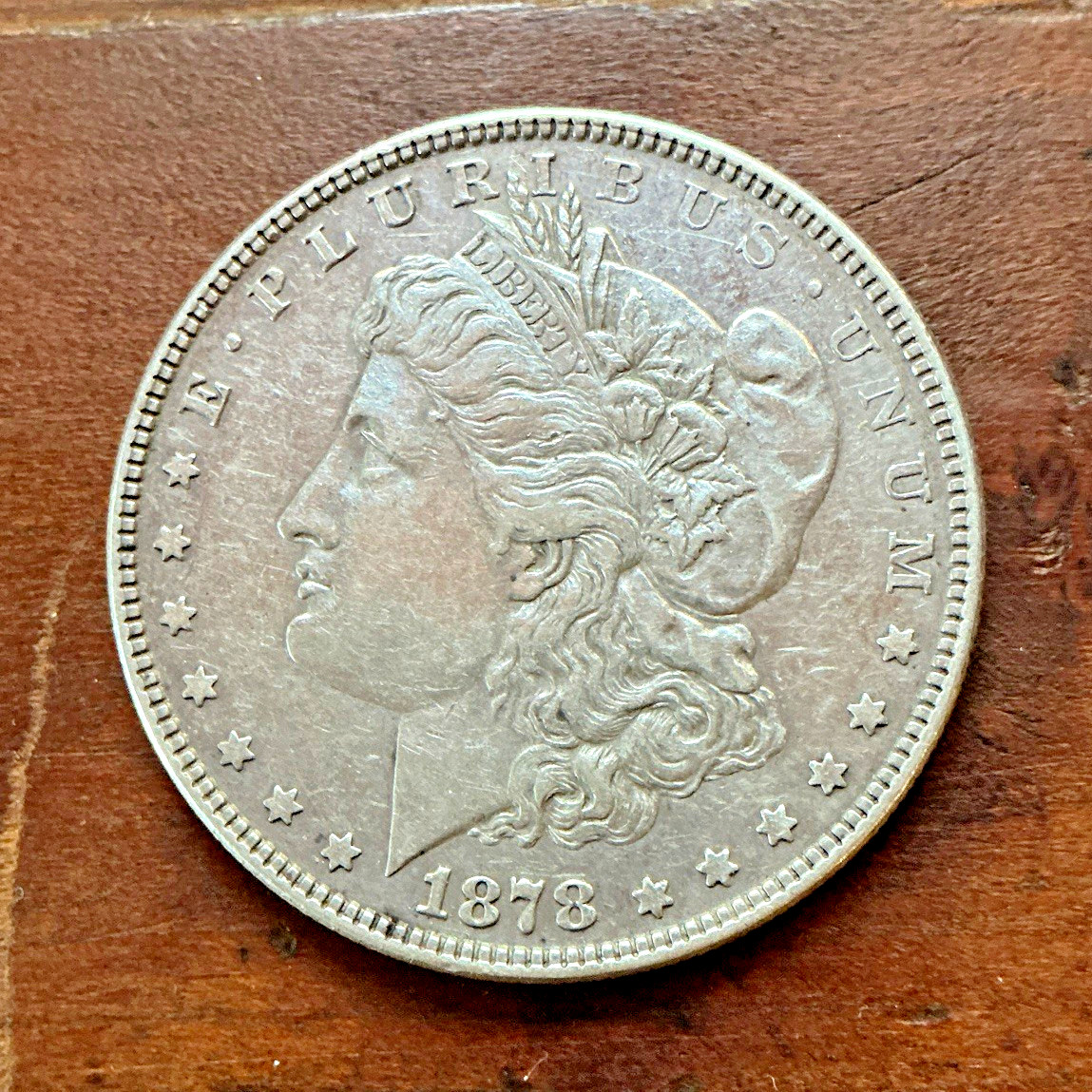 A Rare 1878  8 Tail Feather Morgan Silver Dollar