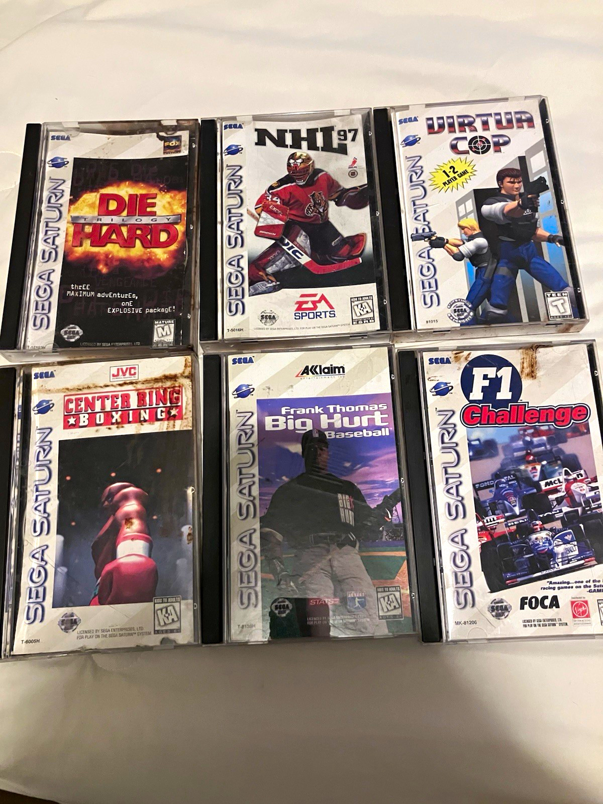 Sega Saturn Game Lot: Die Hard, Virtua Cop, NHL 97, F1 Challenge + More Sega Saturn Game Lot: Die Hard, Virtua Cop, NHL 97, F1 Challenge + More