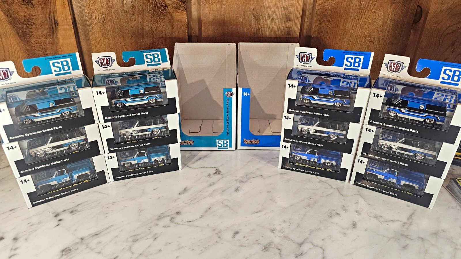 M2 Machines Squarebody Syndicate Lot Of 12 Including 2 Chases, 1 of each color.