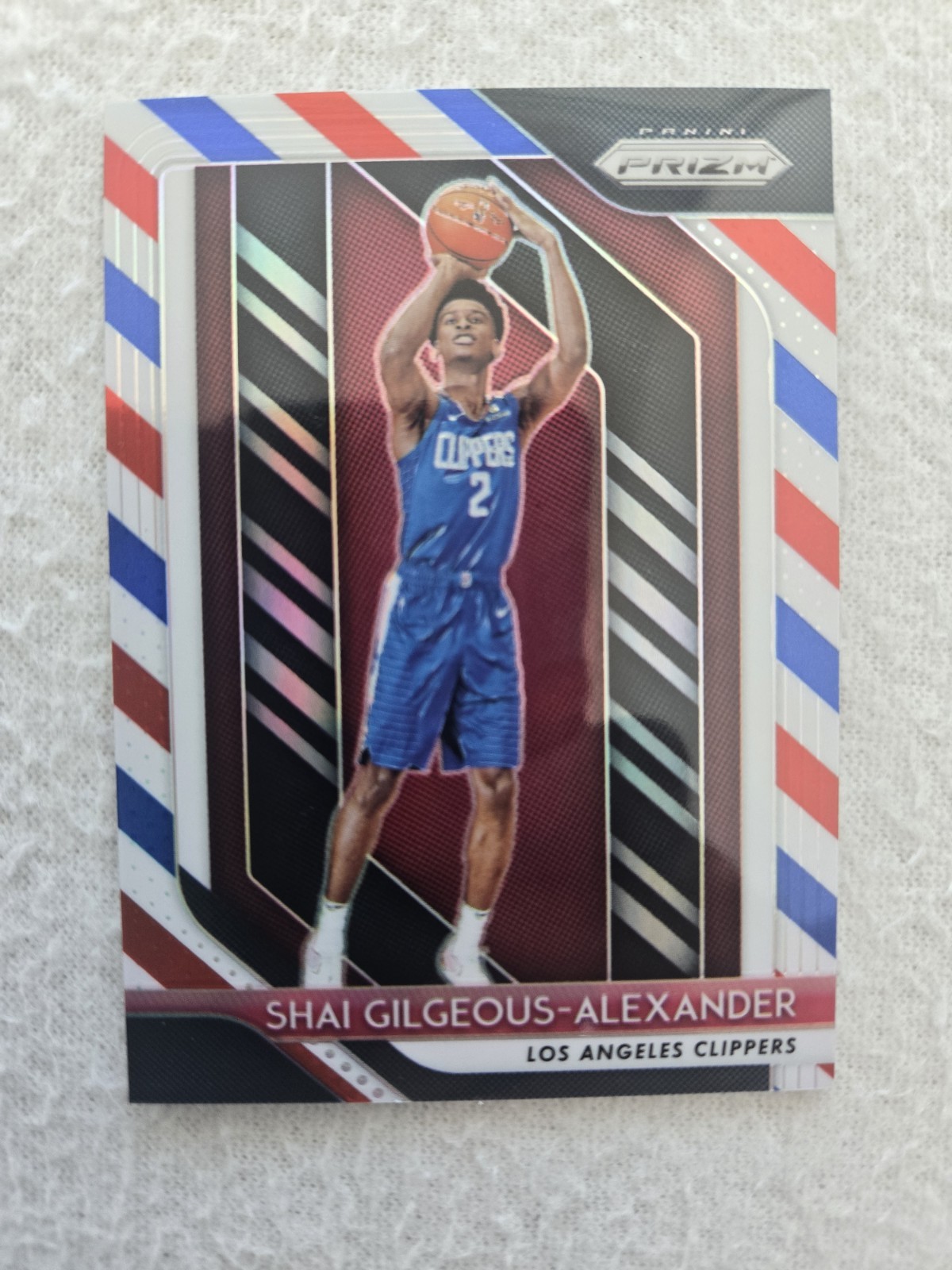 2018-19 Panini Prizm - Shai Gilgeous-Alexander #184 Red White & Blue Prizm (RC) 2018-19 Panini Prizm - Shai Gilgeous-Alexander #184 Red White & Blue Prizm (RC)