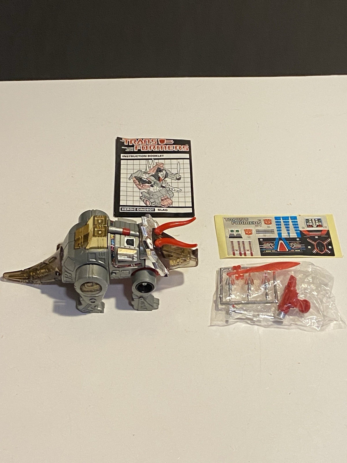 Vintage Canadian Red Face Slag Dinobot Sealed Weapons And Unused Sticker Sheet Vintage Canadian Red Face Slag Dinobot Sealed Weapons And Unused Sticker Sheet