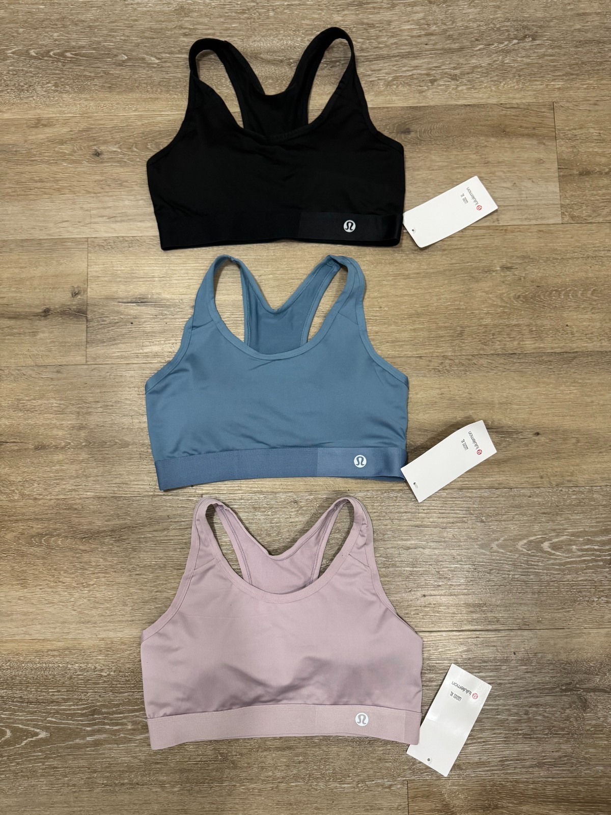 3 PAIR LULULEMON SPORTS BRAS WOMENS SIZE XL 3 PAIR LULULEMON SPORTS BRAS WOMENS SIZE XL