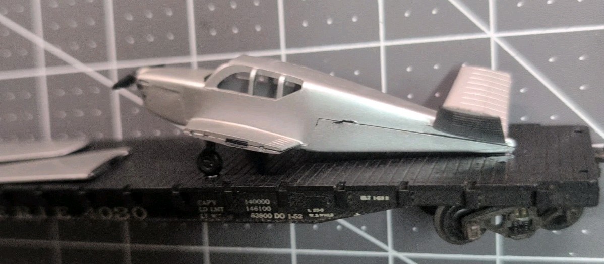 REVELL 1956 40’  flat car wth Athearn Silver plane