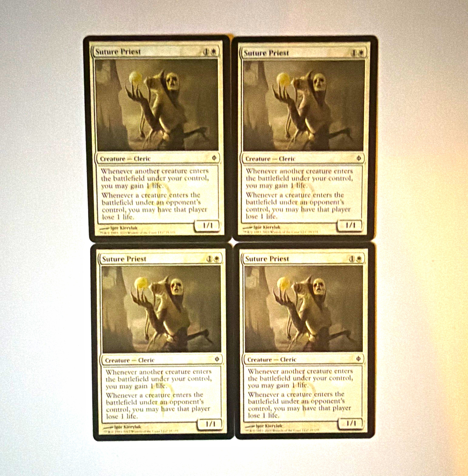 Wizards of the Coast MTG Suture Priest Creature New Phyrexia 25/175 x4 EN