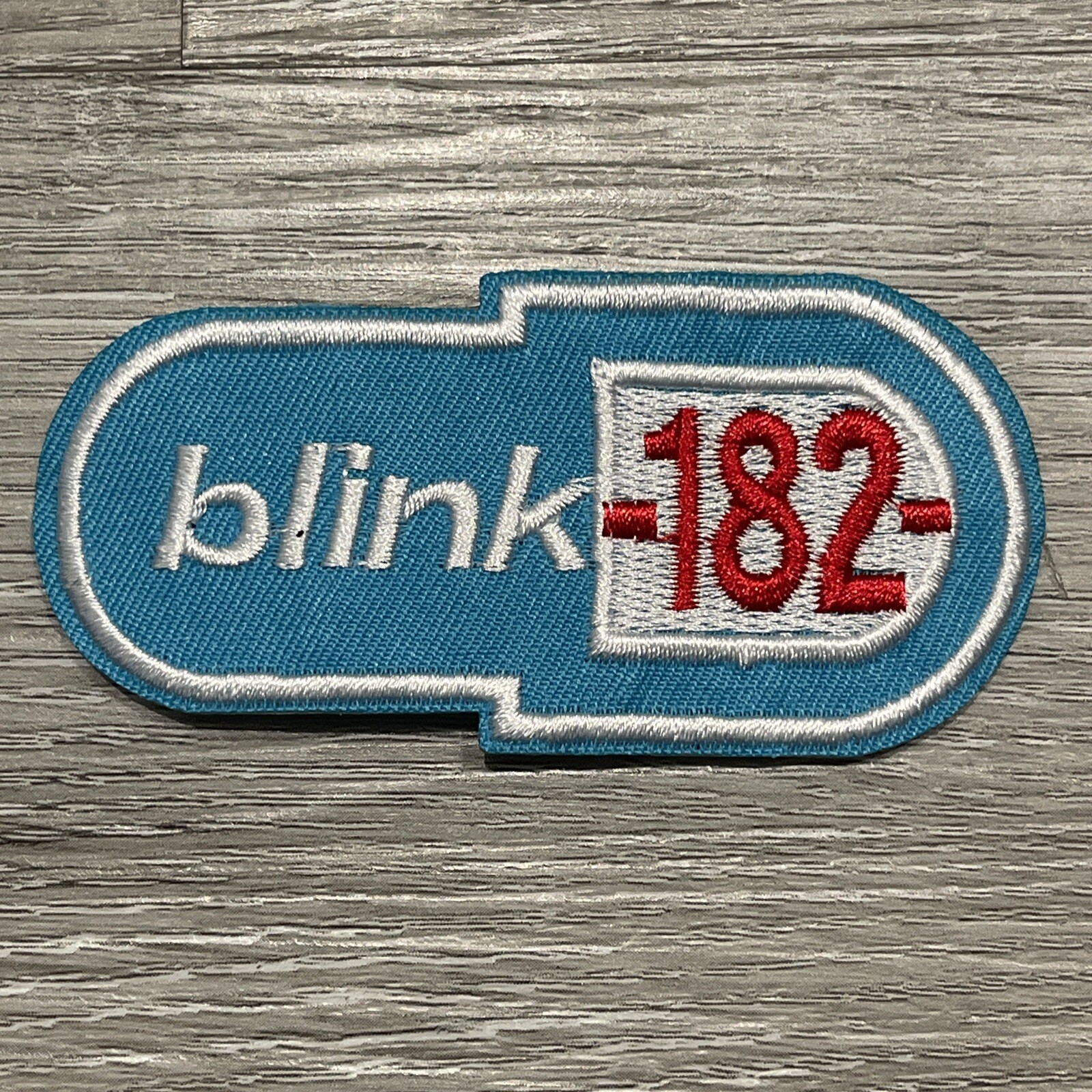 Blink 182 Embroidered Iron On Patch 1.5x3.5 Inch Blink 182 Embroidered Iron On Patch 1.5x3.5 Inch