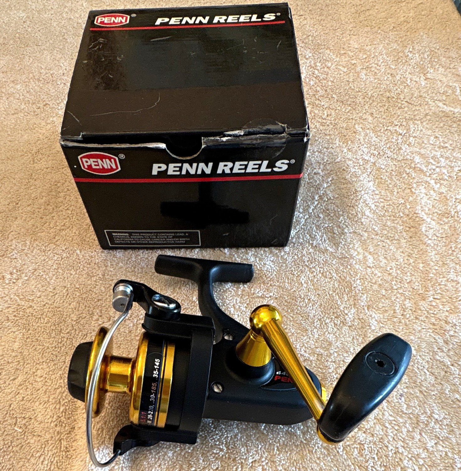 Penn 440 SSG spinfisher graphite infinite anti-reverse five +1 ball bearings