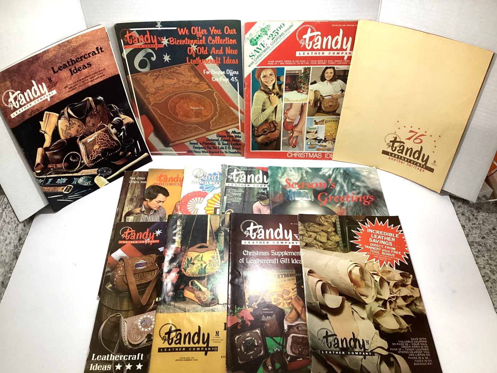VINTAGE 1970 S TANDY LEATHER COMPANY LEATHERCRAFT CATALOGS LOT OF 13 VINTAGE 1970 S TANDY LEATHER COMPANY LEATHERCRAFT CATALOGS LOT OF 13