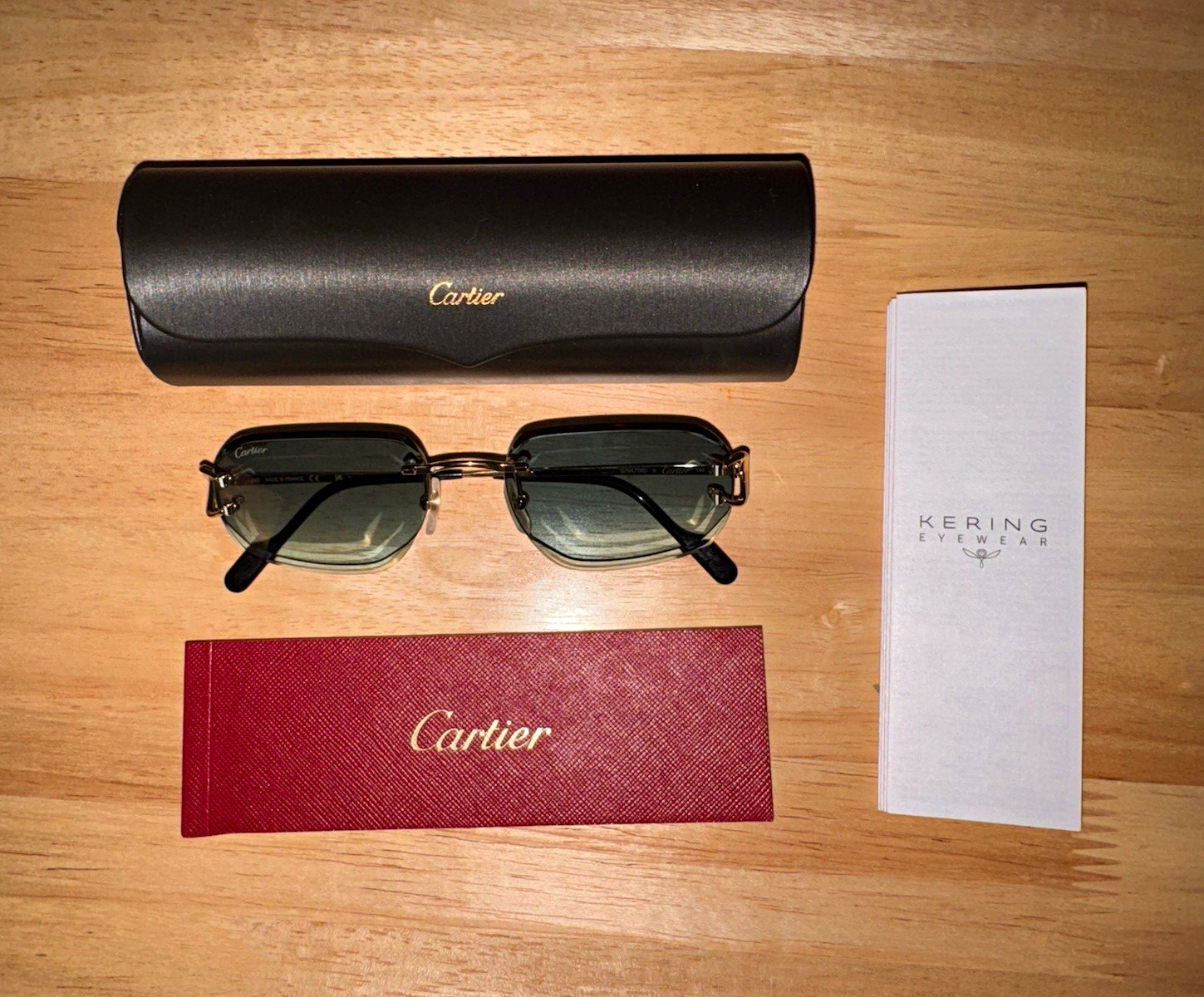 Cartier Signature C Rimless Sunglasses Green Lens Gold Metal CT0468S Cartier Signature C Rimless Sunglasses Green Lens Gold Metal CT0468S