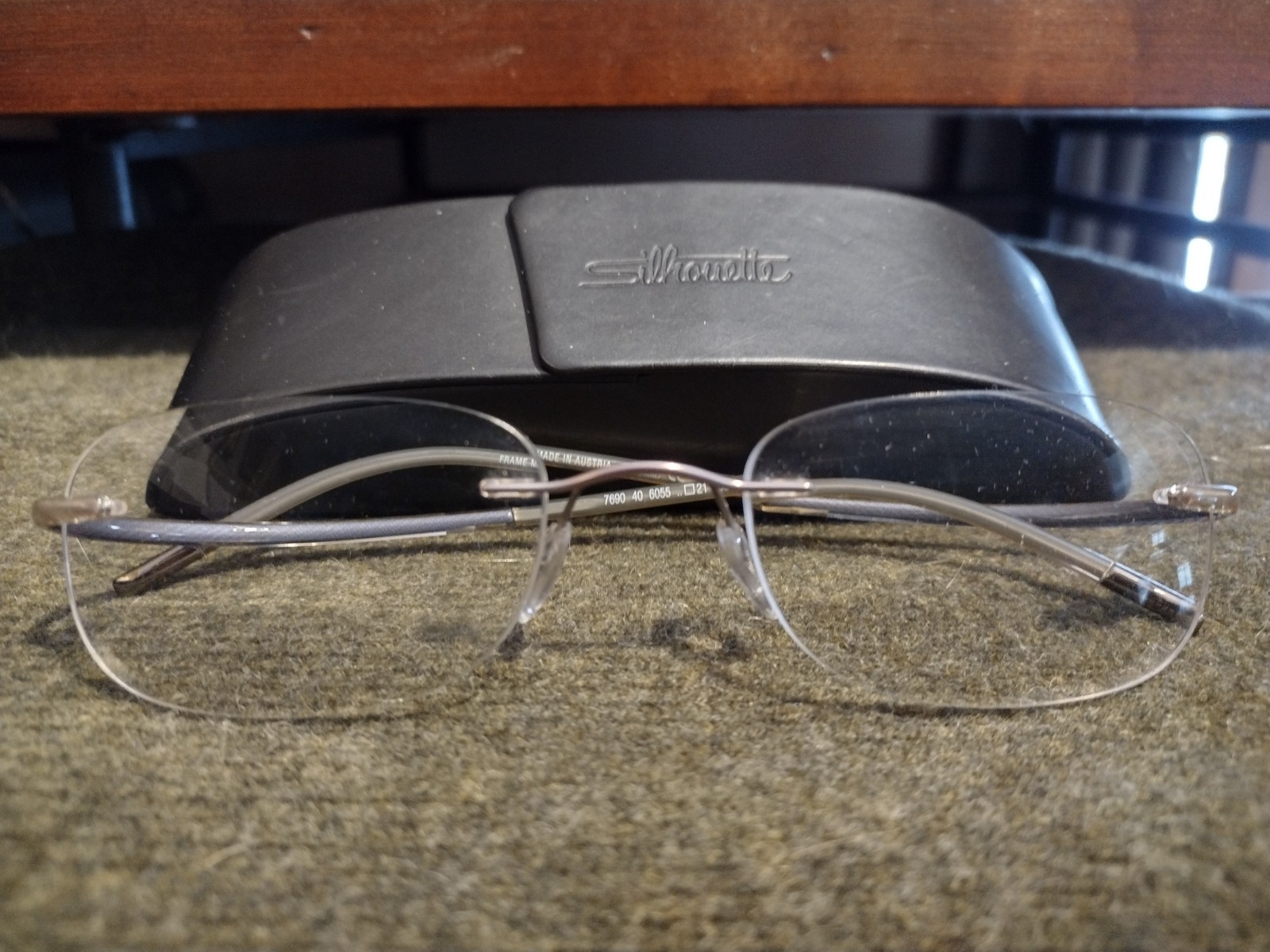 Silhouette 7690 40 60 Clear Gray Rimless Eyeglasses Frames 55-21-155 Silhouette 7690 40 60 Clear Gray Rimless Eyeglasses Frames 55-21-155