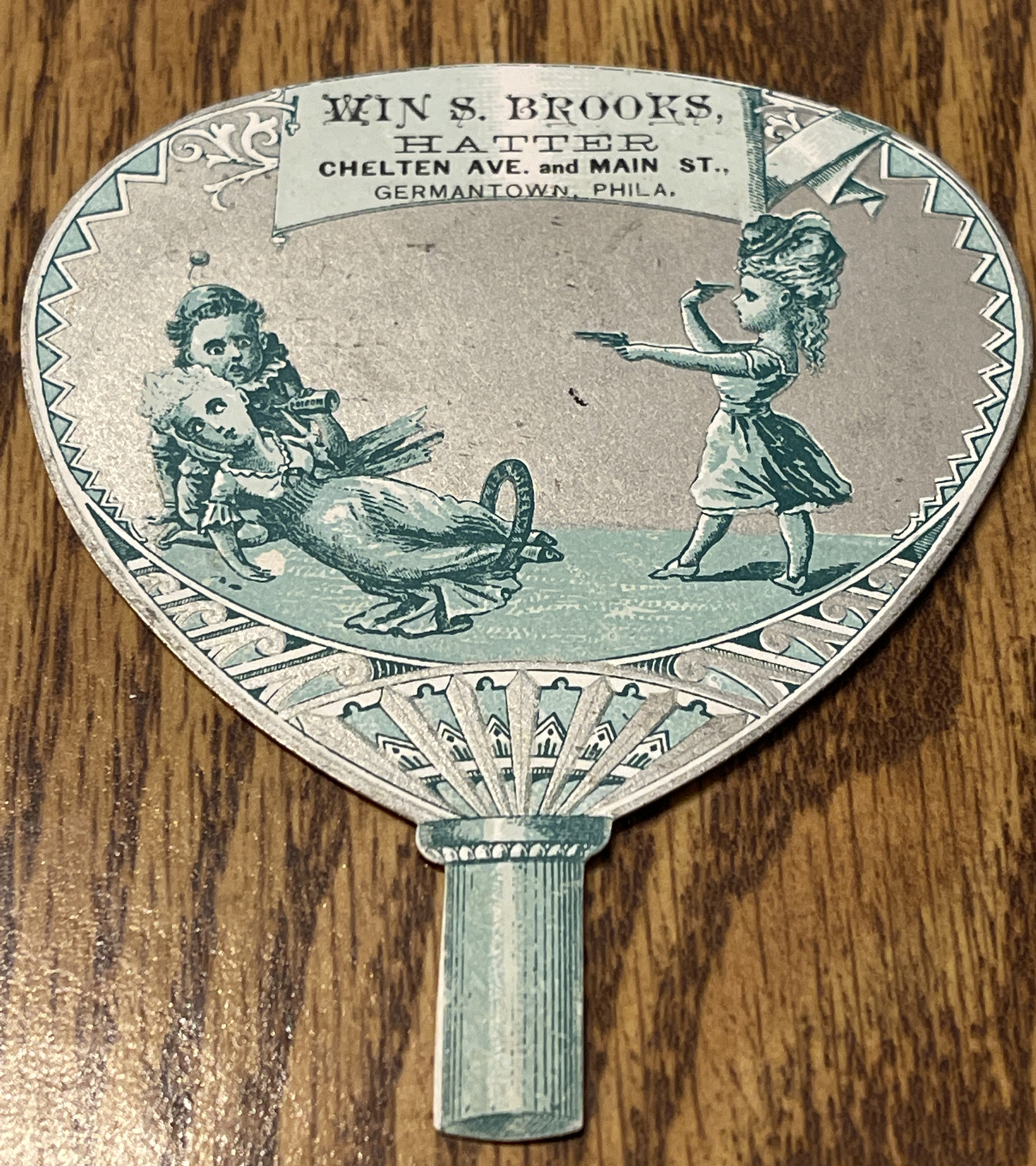 Vintage ~ WIN S. Brooks ~ MAD HATTER ~ TRADE CARD ~ FAN ~ PISTOLS  ~ RARE