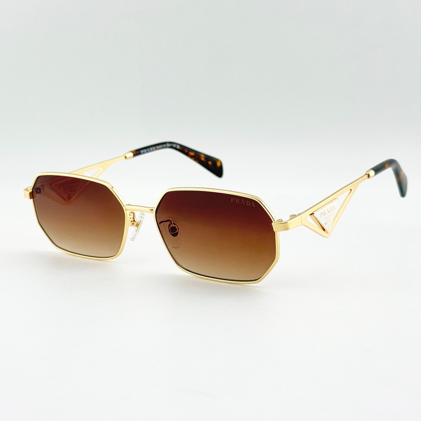 Prada SPRA51S Women\'s Irregular Sunglasses Gold Frame Brown Lens 58mm