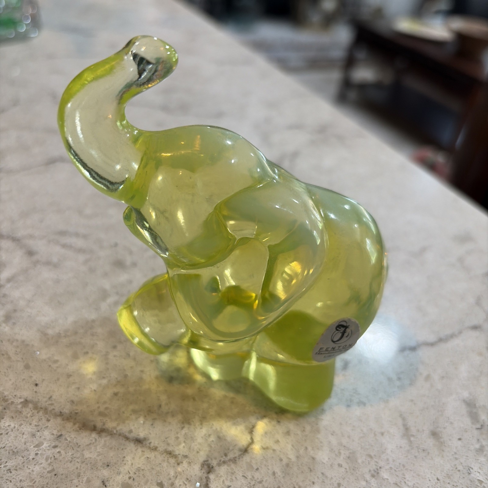 Vintage Fenton Vaseline Uranium Opalescent Glass Trunk Up Elephant. With label. Vintage Fenton Vaseline Uranium Opalescent Glass Trunk Up Elephant. With label.
