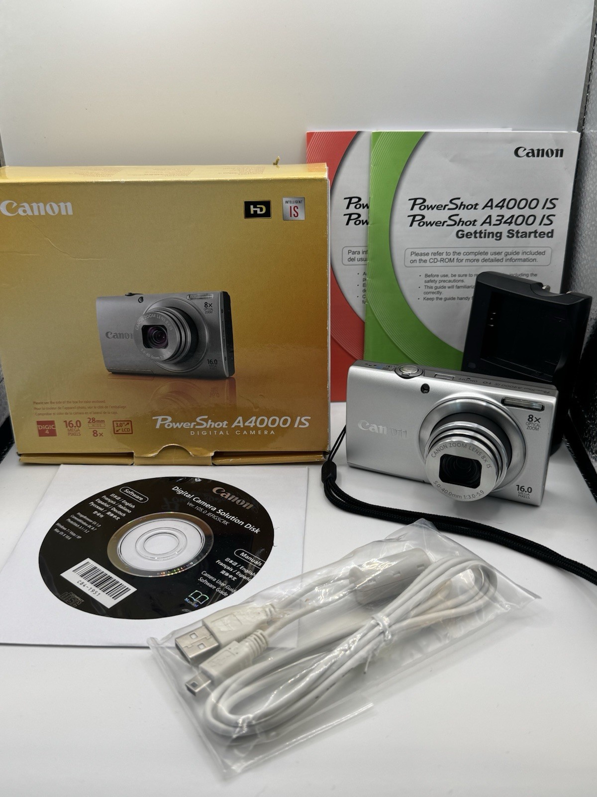 Canon PowerShot A4000IS 16 MP Digital Camera 8X Optical Zoom Pristine Condition