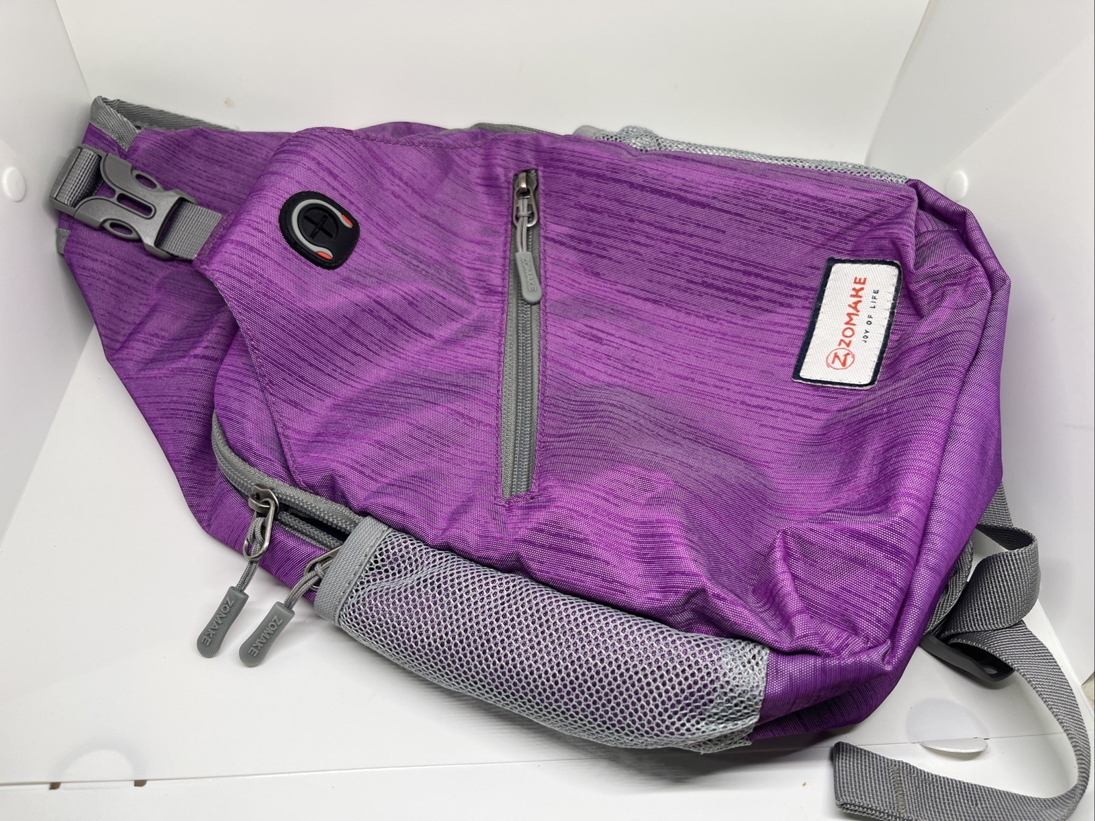 ZOMAKE Joy of Life Purple Sling Backpack Crossbody Travel Daypack