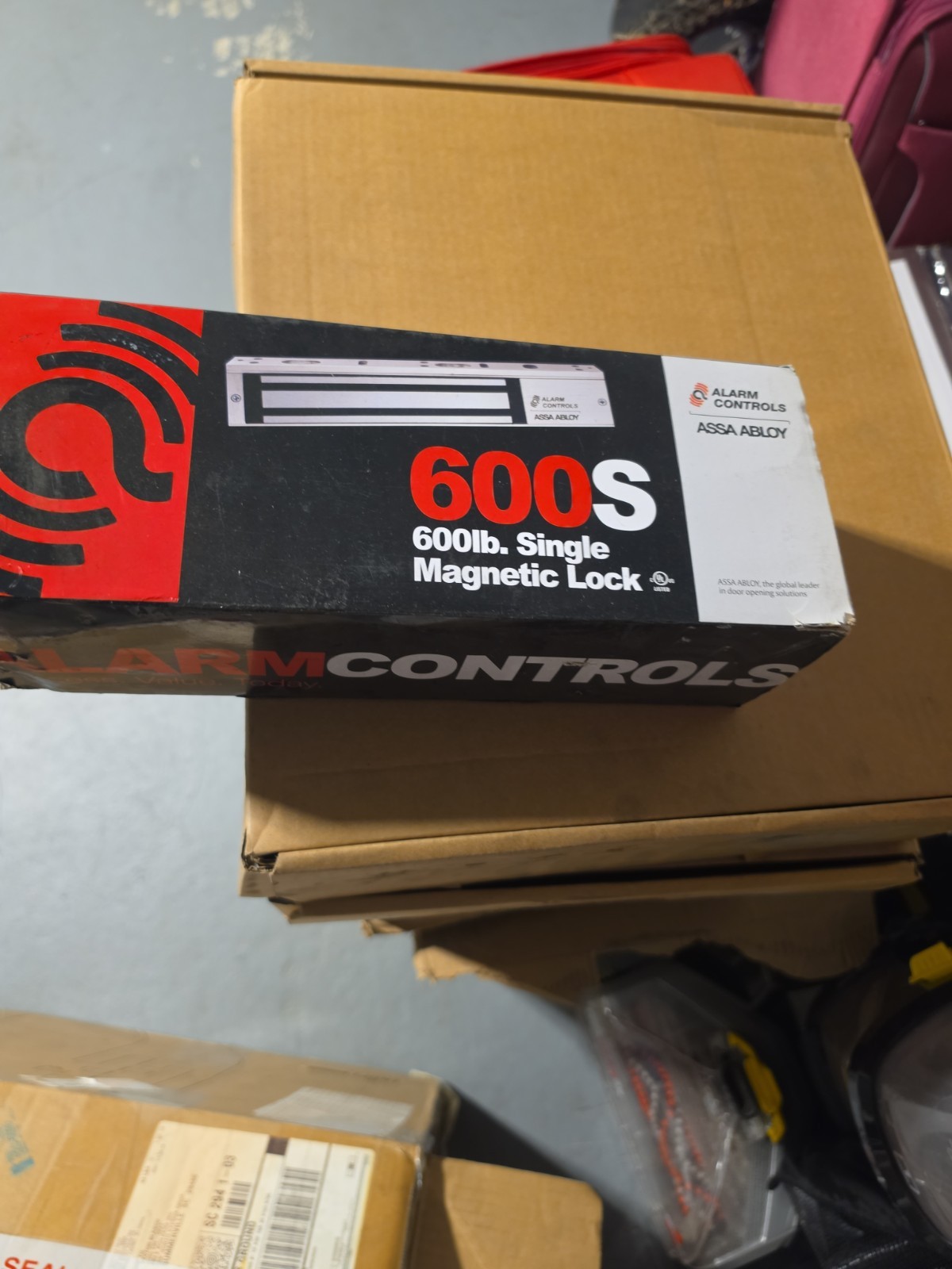 ASSA ABLOY Alarm Controls 600LB Single Door Magnetic Lock 12/24VDC LED US28 ASSA ABLOY Alarm Controls 600LB Single Door Magnetic Lock 12/24VDC LED US28