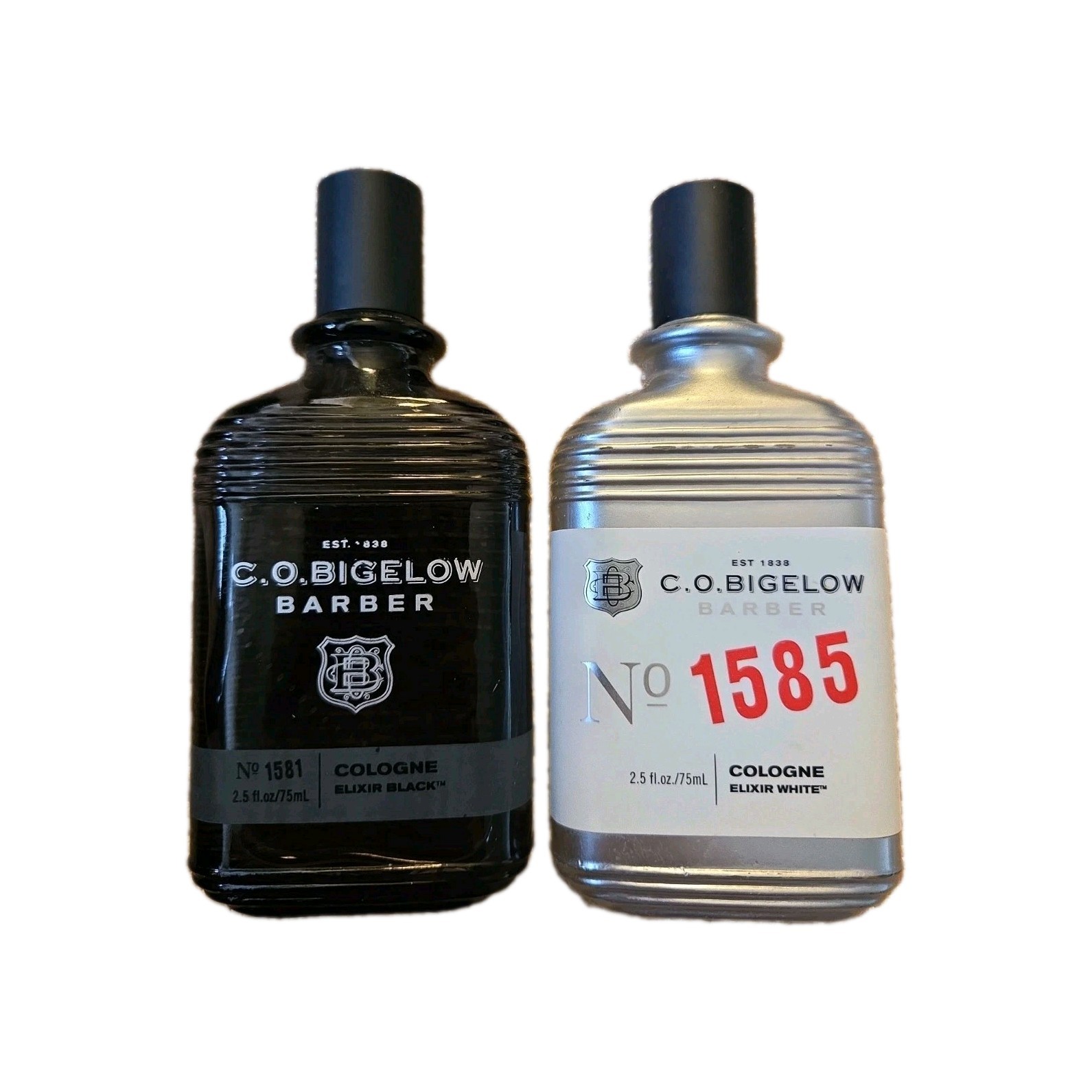C.O. BIGELOW BARBER COLOGNE 1581 & 1585 ELIXER BLACK & ELIXER WHITE 3/4 FULL C.O. BIGELOW BARBER COLOGNE 1581 & 1585 ELIXER BLACK & ELIXER WHITE 3/4 FULL
