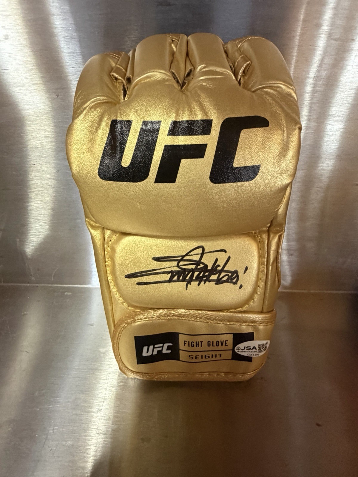 Ateba Gautier Signed Official Gold Official UFC Glove JSA COA “THE STORM” UFC Ateba Gautier Signed Official Gold Official UFC Glove JSA COA “THE STORM” UFC