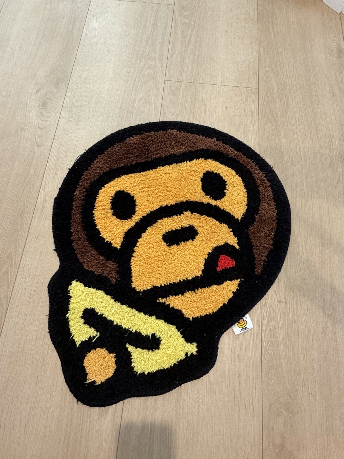 A BATHING APE BAPE Baby Milo Monkey Face Novelty Rug Mat Black Brown Yellow A BATHING APE BAPE Baby Milo Monkey Face Novelty Rug Mat Black Brown Yellow
