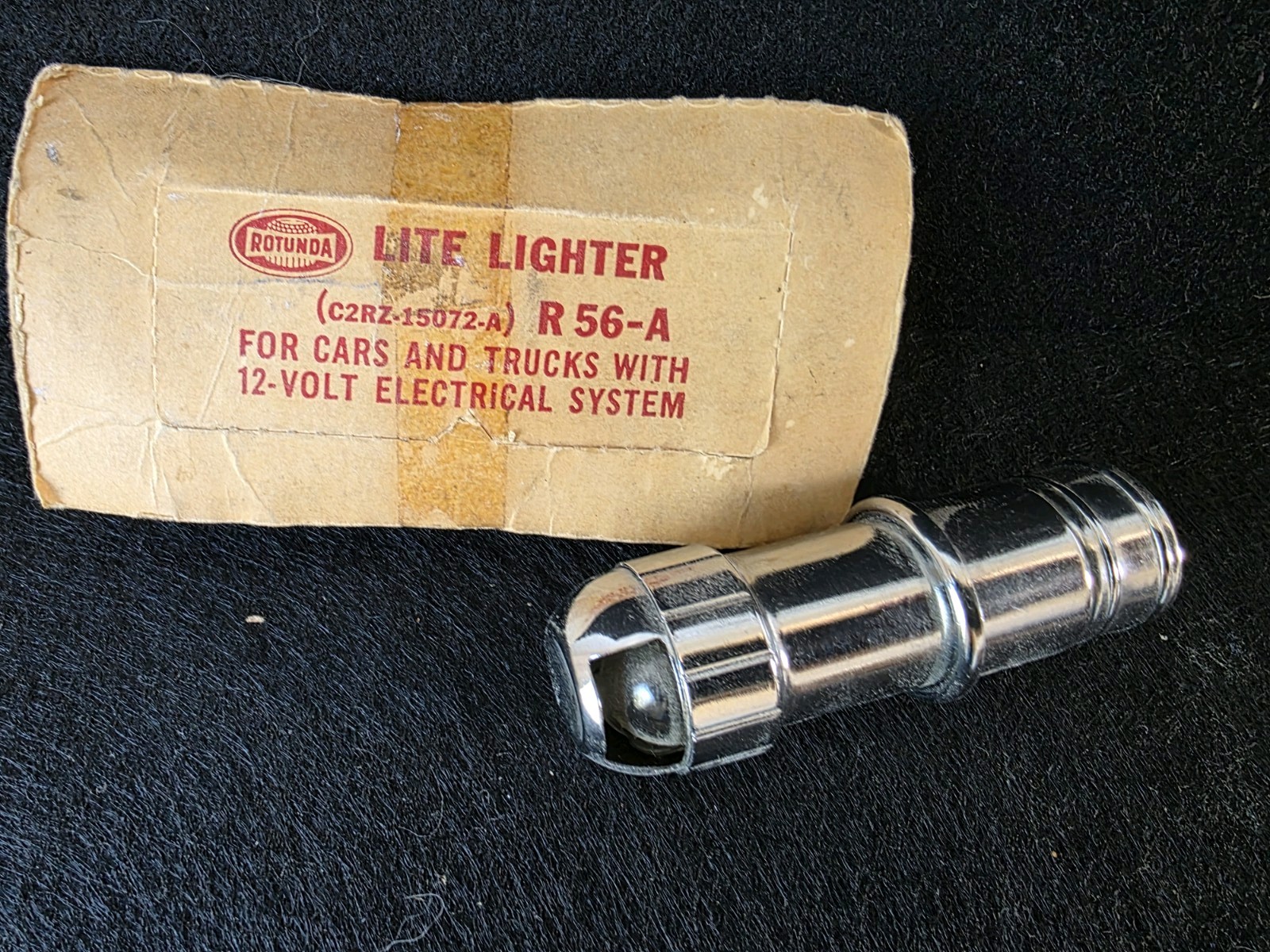 NOS FORD ROTUNDA LITE LIGHTER. R56-A. PART # C2RZ-15072-A NOS FORD ROTUNDA LITE LIGHTER. R56-A. PART # C2RZ-15072-A