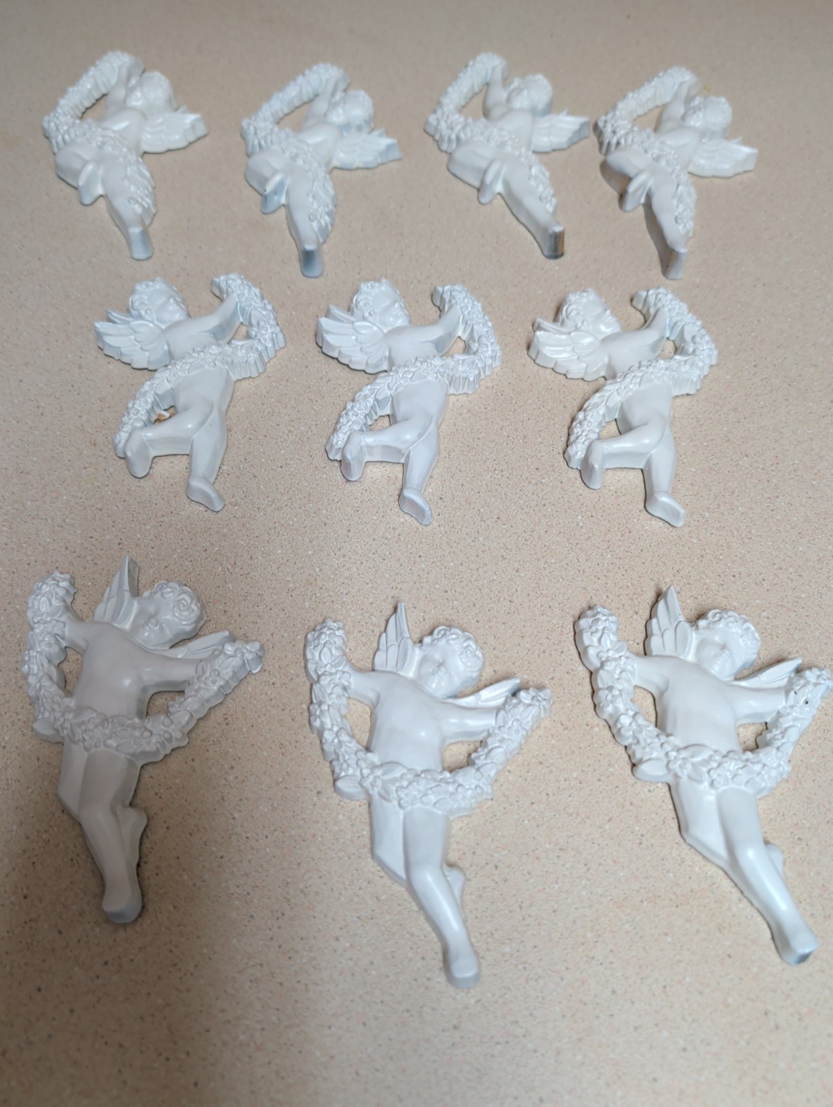 Cherub Wall Plaques Flying Angel Figures Ivory Lot of 10 Cherub Wall Plaques Flying Angel Figures Ivory Lot of 10