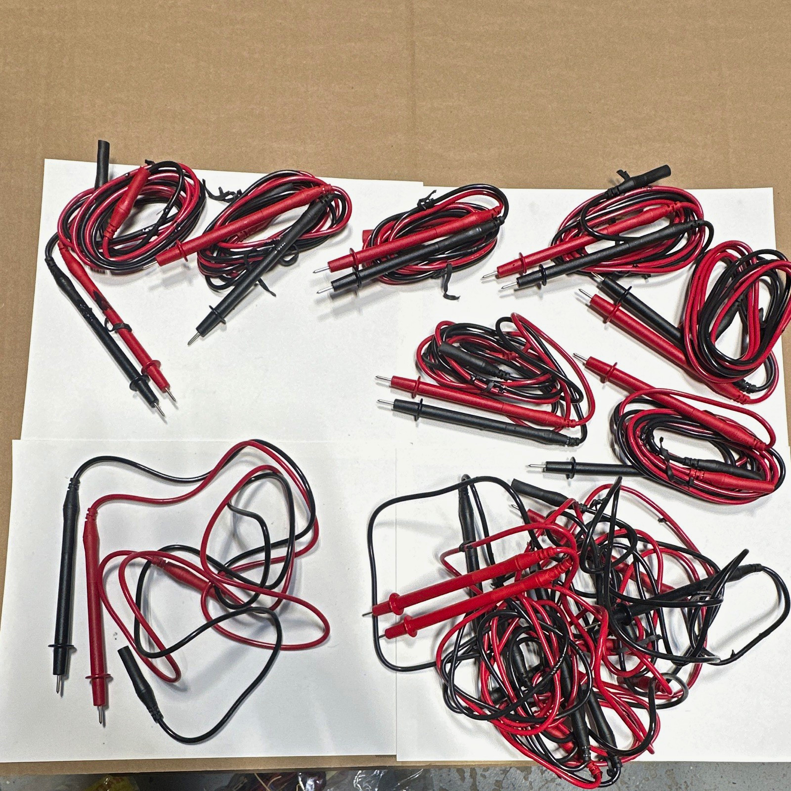 Lot of 11 Vintage Fluke multimeter leadset. New but have melted rubber on them.