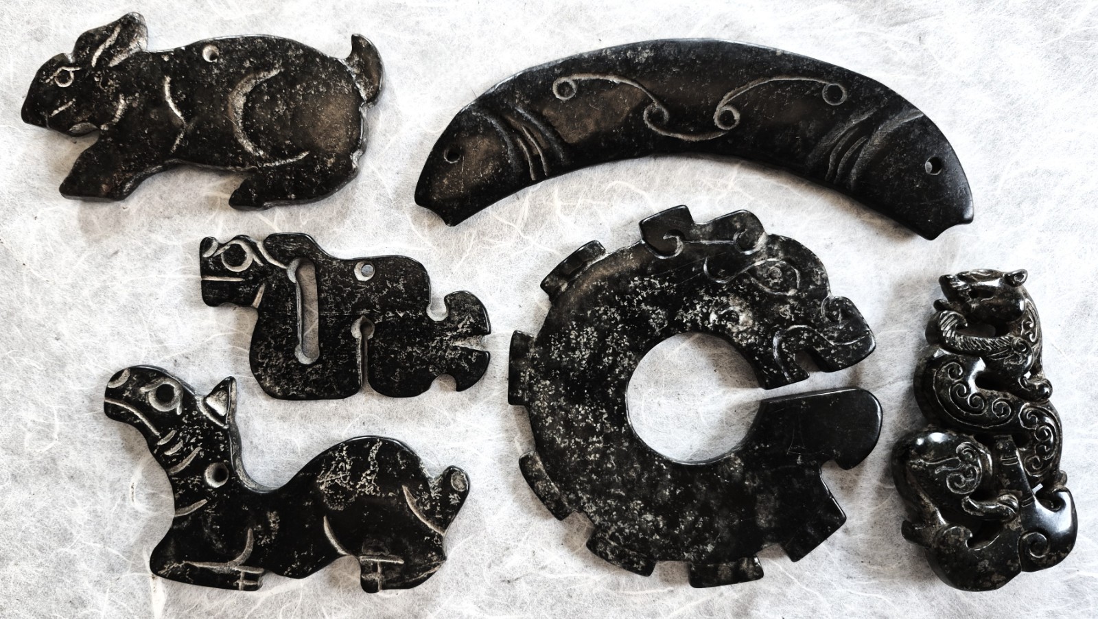 Collection of Six Chinese Hongshan Culture Black Magnet Jade Carvings