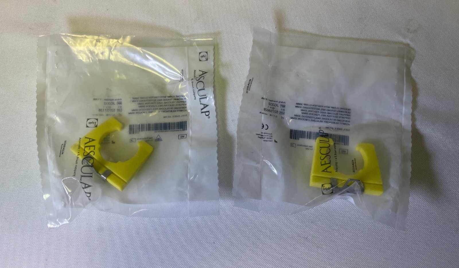 Pair of Aesculap JG332 Silicone Clamp w Fixation Clamp 30mm Sterilization Insert