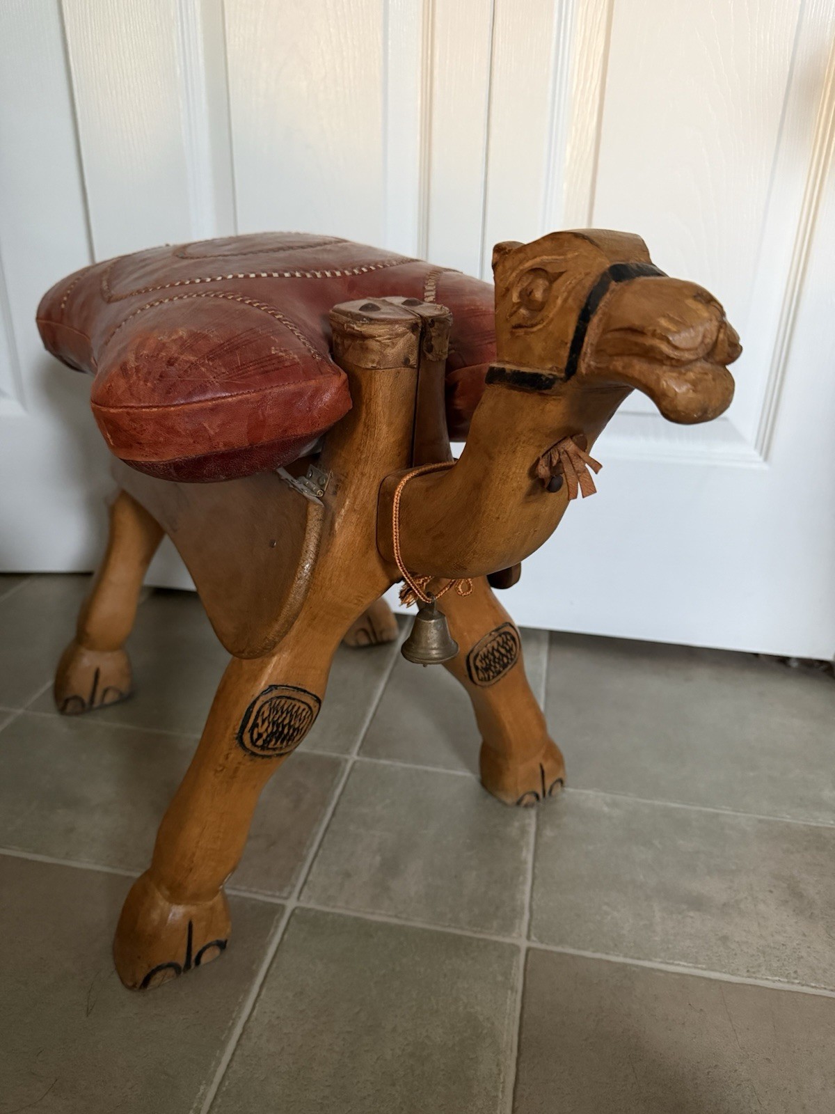 Vintage Hand Carved Wood Camel Saddle Stool Brown Leather Ottoman Brass Accents