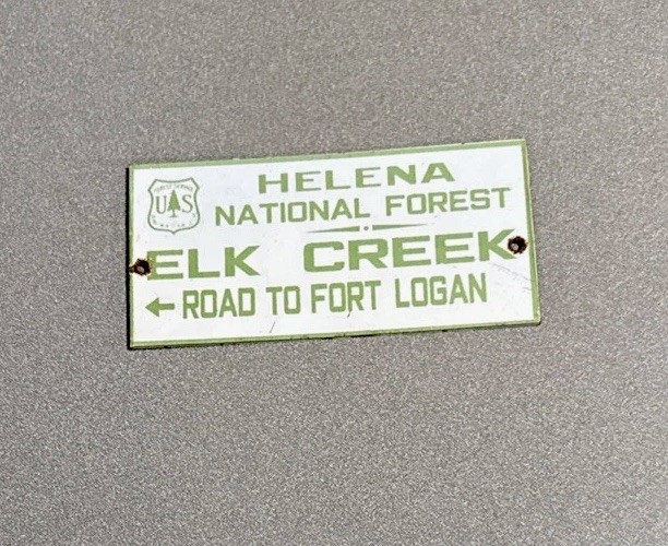 VINTAGE HELENA ELK CREEK SMOKEY PORCELAIN SIGN CAR GAS OIL TRUCK MOTORCYCLE VINTAGE HELENA ELK CREEK SMOKEY PORCELAIN SIGN CAR GAS OIL TRUCK MOTORCYCLE