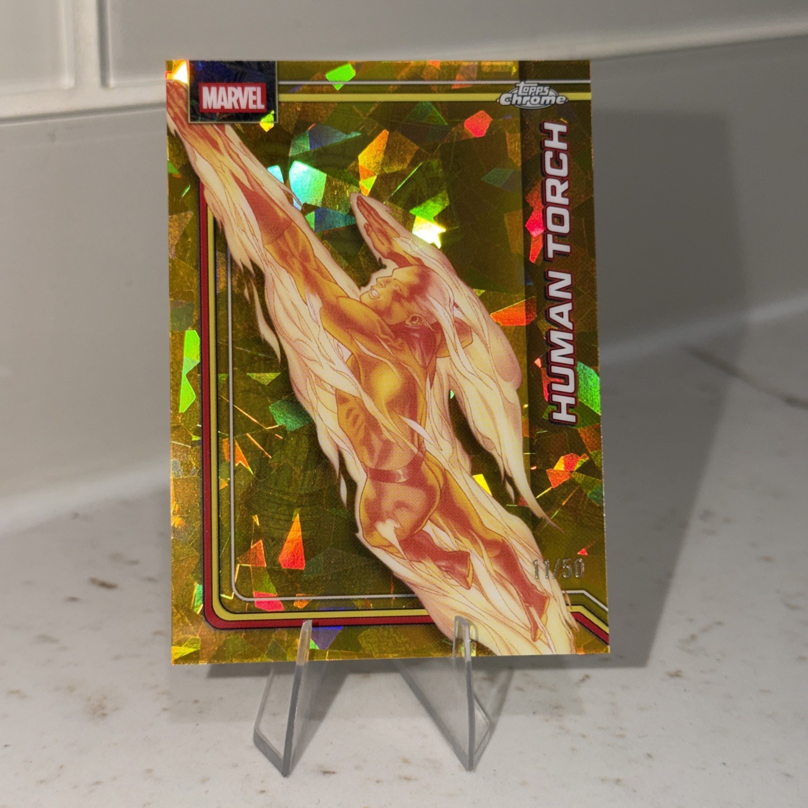 2026 Topps Chrome Marvel Sapphire Human Torch Gold /50 2026 Topps Chrome Marvel Sapphire Human Torch Gold /50